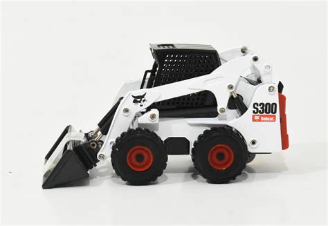 big skid steer toys|toy bobcat skid steer attachments.